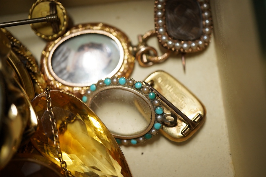Six assorted 19th century mourning brooches including William IV yellow metal with plaited hair date 1834 and George III with split pearl and hair, largest with carved wax? panel depicting deer, 56mm, a Murrle Bennet & C